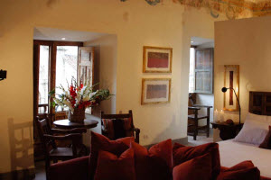 Inkaterra La Casona Boutique Hotel in-suite fireplace