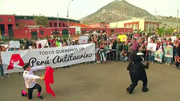 Anti-bullfighting protesters demonstrate outside the Plaza de Toros de Acho bull fighting ring in Lima, Peru