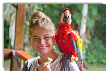 Amazon Rainforest tours - Refugio Lodge and the kid-macaw connection