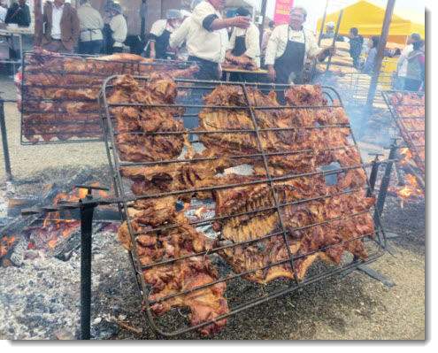 Chancho al Palo, open wood grilled suckling pig, served up at Mistura 2013