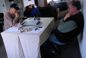 Ben Withers, TX, and Bob Linn, MD, face off in the opening round of TWL play in the Peru Tour &amp; ScrabbleÂ® competition in Lima, Peru.