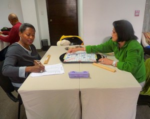 Julia Scruggs and Celia Dayrit Thompson participate in the opening of the Scrabble tournament, combined with luxury Peru tour, starts in Lima's Miraflores district. 