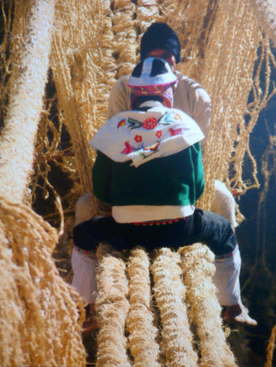 Weaving the Q’eswachaka bridge ~ © 2010 Peru National Institute of Culture