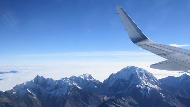 Best airline for stunning ice peak mountain views during flight to Cusco