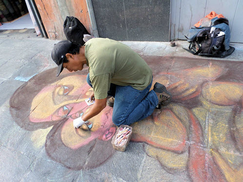 Lima street artist at work