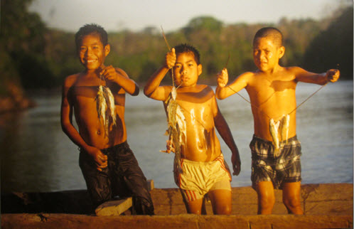 children fishing in the Amazon rain forest