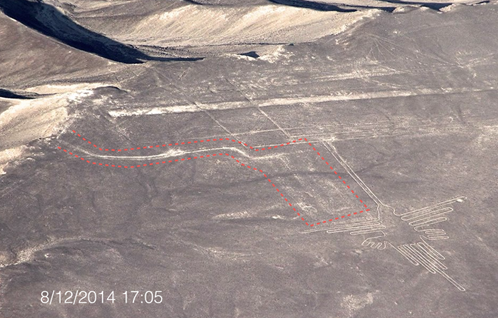 Red line demarcates damage allegedly caused by climate activists during their march to the iconic Hummingbird at the Nazca Lines