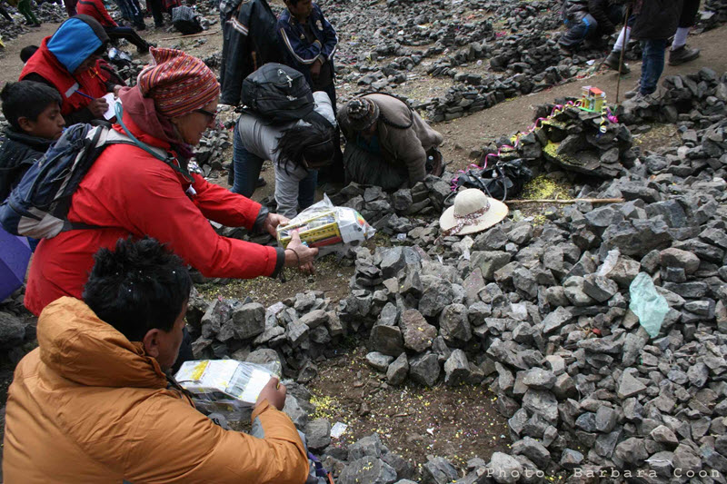 Vendors sell “alacitas,” or small keepsakes, to take to the chapel to be blessed in a symbolic gesture to achieve your heart’s desire.