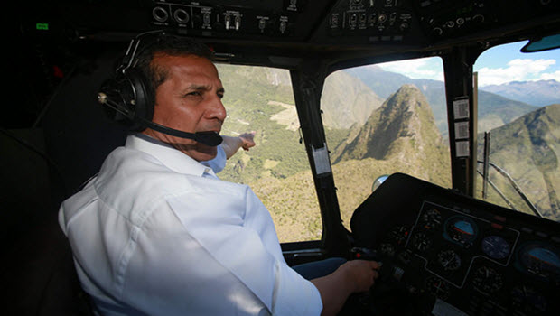 President Ollanta Humala pilots his helicopter for a spin around Machu Picchu