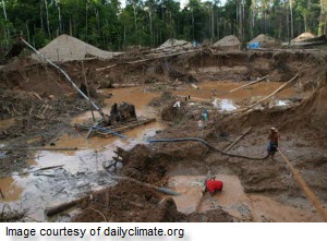 A newly paved road - and soaring gold prices - have triggered a Klondike-style gold rush in Peru's rain forest, choking waterways with sediment, and threatening the country's ability to preserve the forest via profitable carbon-offset deals. Photograph © Barbara Fraser.