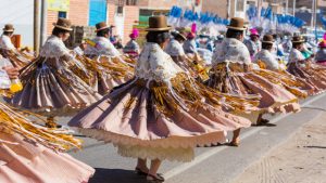 People dancing in the streets for Candelaria Festival - Puno Peru - Photo by @adobestock