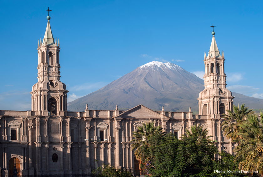 Misty Volcano looks behind the Cathedral of Arequipa
