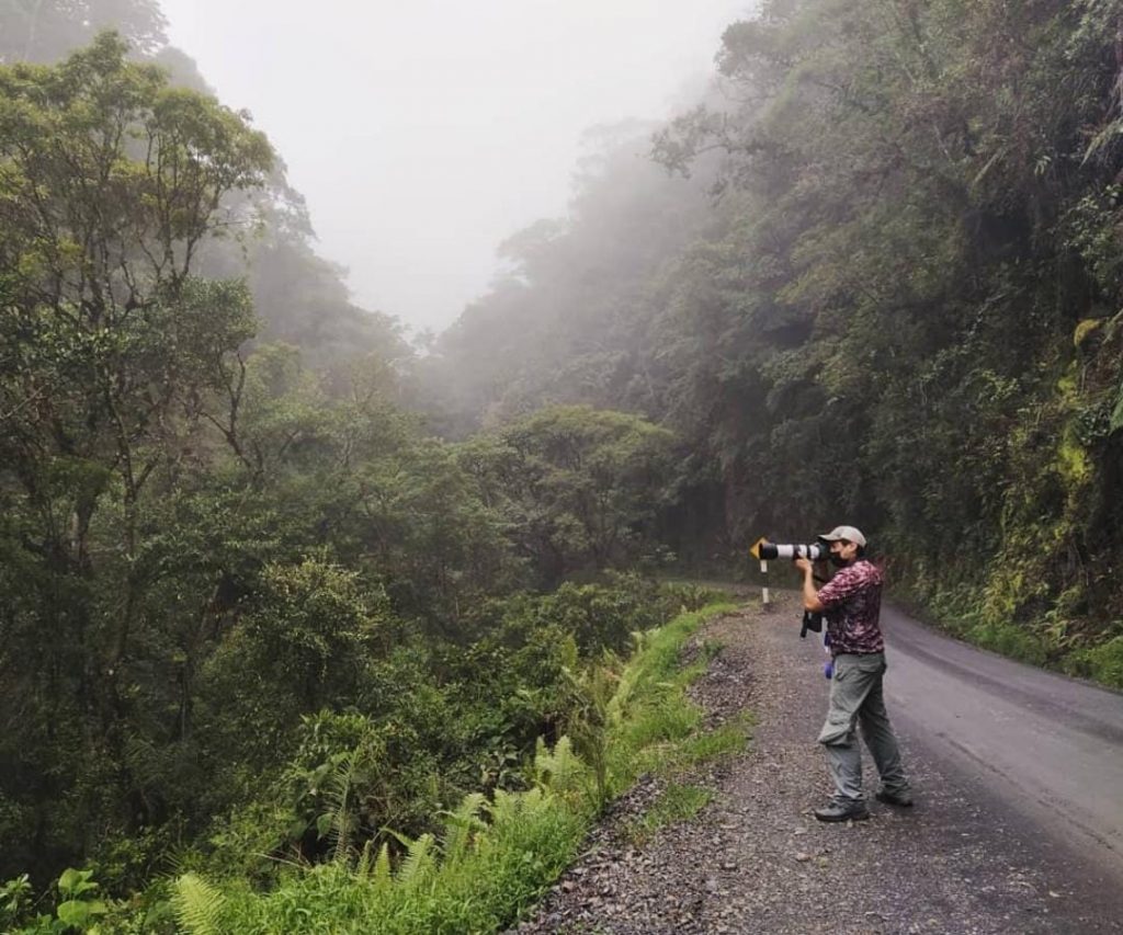 Expert bird watching guide and wildlife photographer Danny Vargas with his camera in Cusco