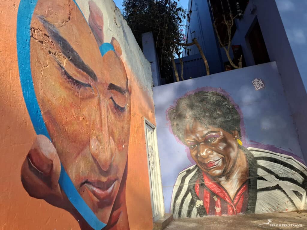 Jade Rivera Murals Near the Bridge of Sighs, Barranco, Lima | Peru Travel Blog Two large-scale portrait murals by Peruvian street artist Jade Rivera on the walls of the Bajada de los Baños, steps from the Puente de los Suspiros in Barranco, Lima. Photo by Fertur Peru Travel..