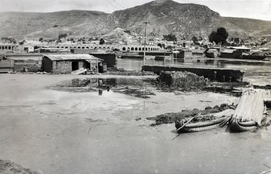 Lake Titicaca Floodwaters Inundating the Port and Lakeside Streets of Puno, Peru, April 1986 | Peru Travel Blog archival photograph documenting one of the most severe high-water events recorded on Lake Titicaca in the late twentieth century — the catastrophic April 1986 flood that submerged Puno's port district and lakeside streets under the rising waters of the world's highest navigable lake.