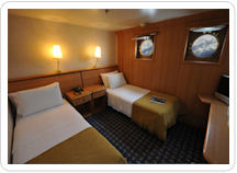 Comfortable Superior Cabin aboard the M/V Galapagos Legend.