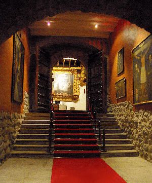Main entrance with red carpet on the stairs