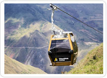 One of the aerial cable car gondolas ascends high over the valle from Nuevo Tingo to the Chachapoya Temple Fortress of Kuelap. 