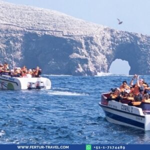 Travelers on tour boats to the Ballestas Islands, Paracas, Peru