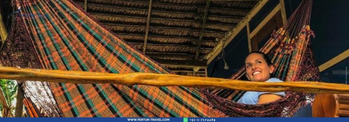 Muyuna Amazon Lodge 4 Days 3 Nights: Relax in authentic jungle accommodations near Iquitos, Peru. Experience comfort and adventure in the heart of the Amazon rainforest with traditional hammocks and eco-friendly lodging.