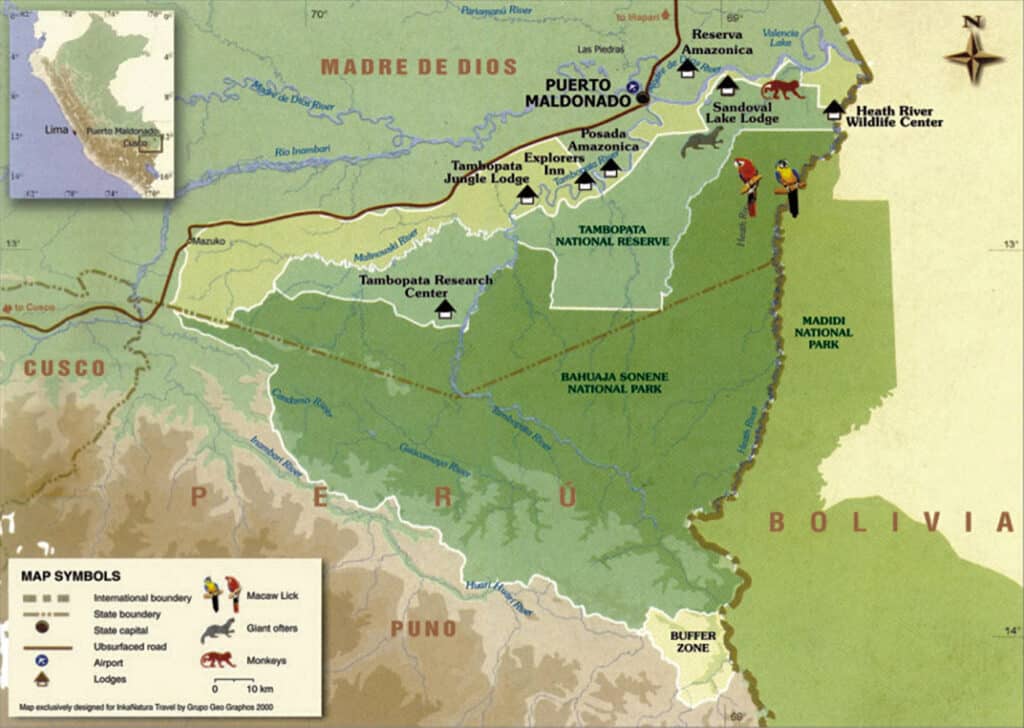 Mapa turístico de la Reserva Nacional Tambopata-Candamo que muestra los alojamientos, ríos y rutas de acceso en Madre de Dios, Perú.